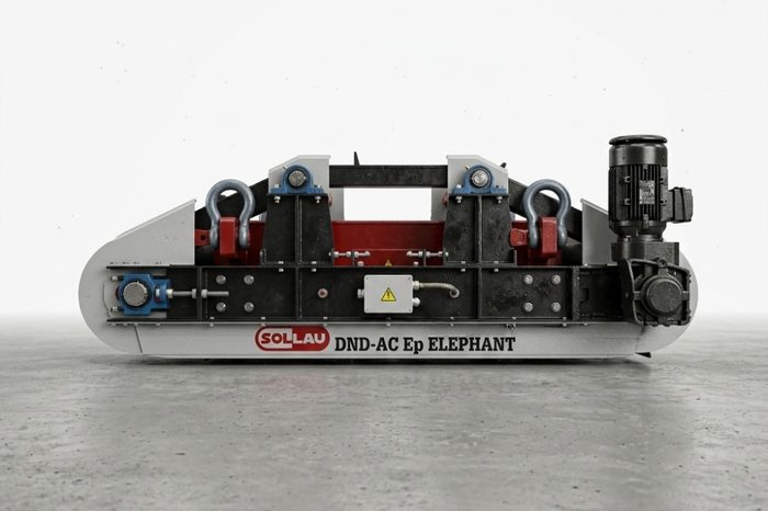 Elektromagnetischer Überbandmagnetabscheider DND-AC-E über einem Förderband